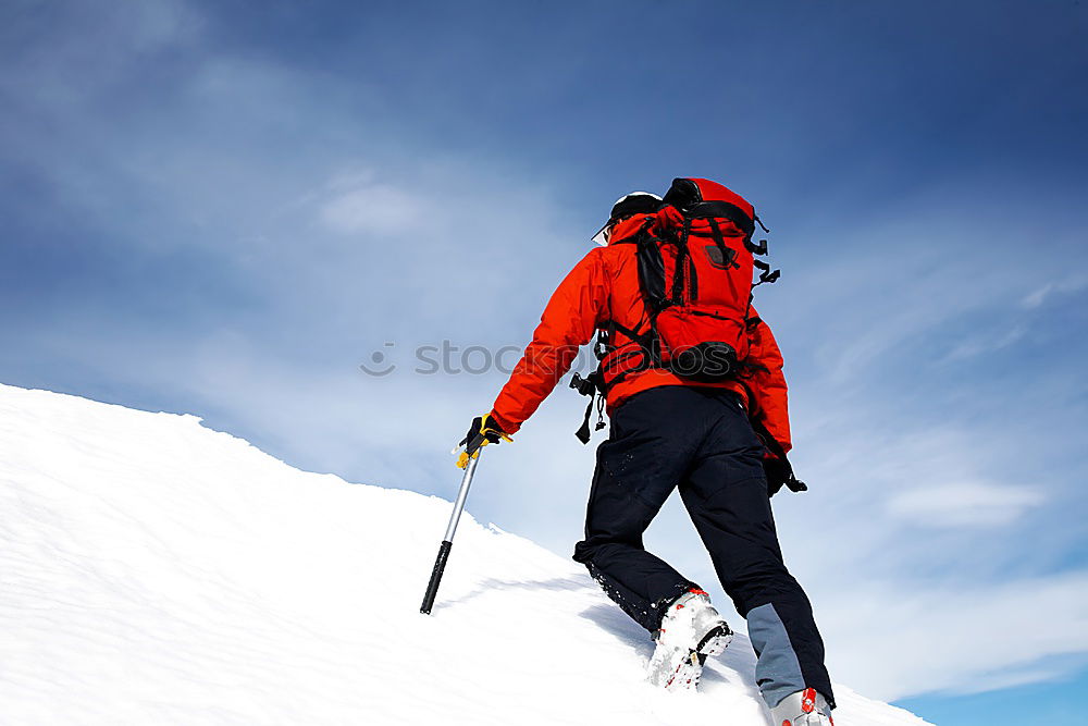 Similar – Image, Stock Photo Skier with rucksack in a snowy landscape, looking backwards