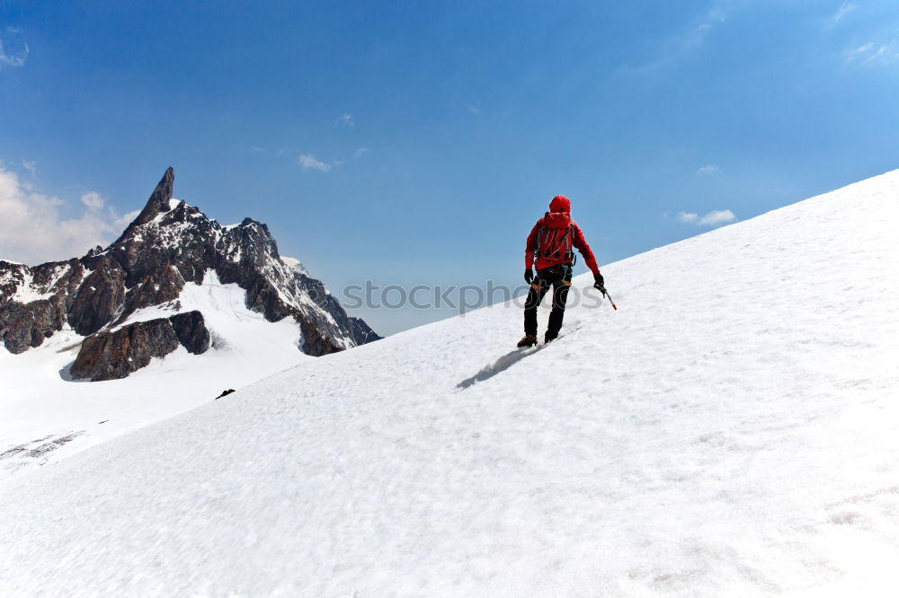 Similar – Image, Stock Photo Mountaineer at the top of a snowy mountain