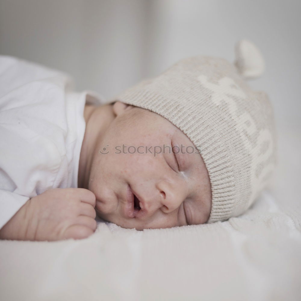 Similar – Portrait of a newborn baby sleeping