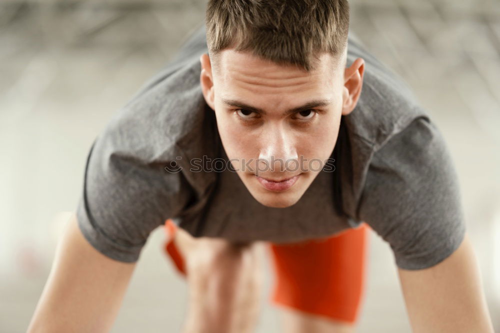 Similar – Attractive man doing pushups in the gym.