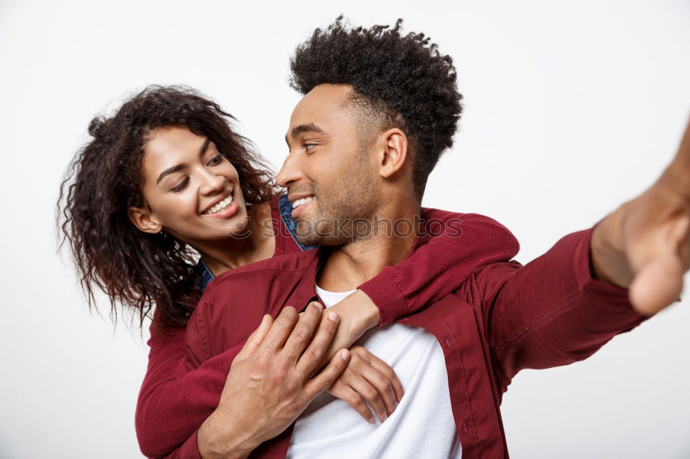 Similar – Loving Young Couple Hugging And Kissing At Home Standing In Kitchen Together