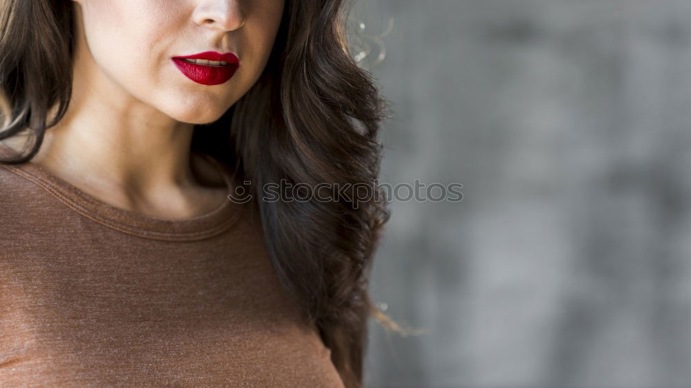 Similar – Woman standing on the street