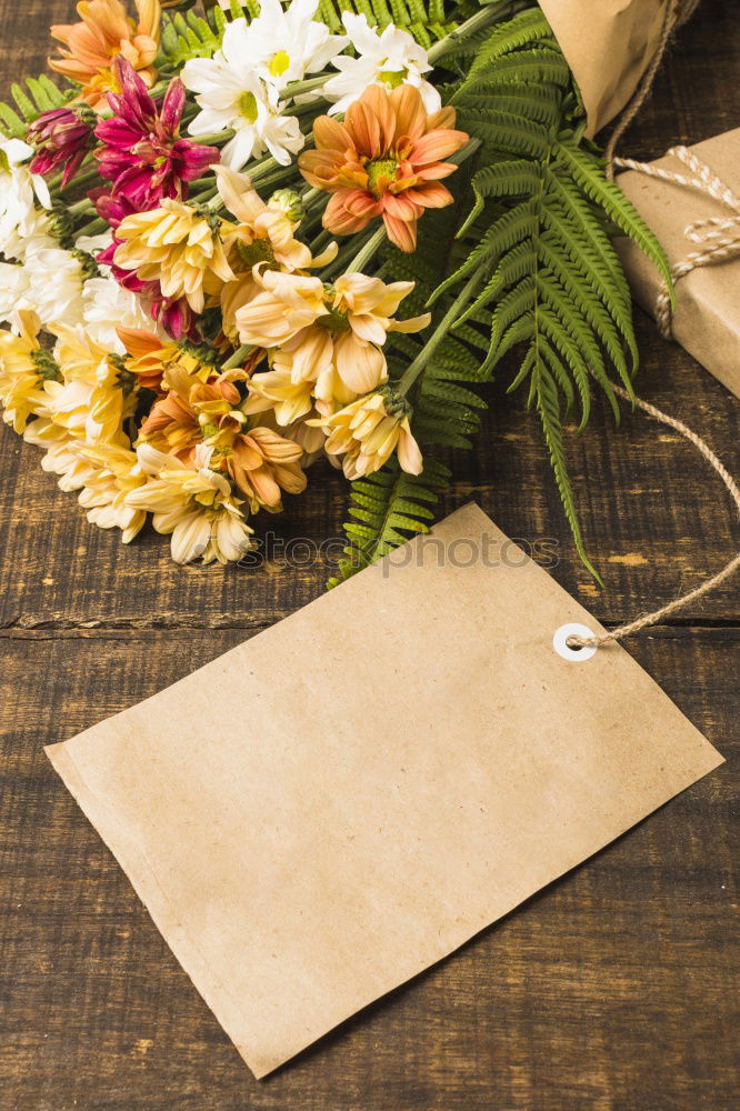 Similar – Bouquet of mixed flowers and a message card