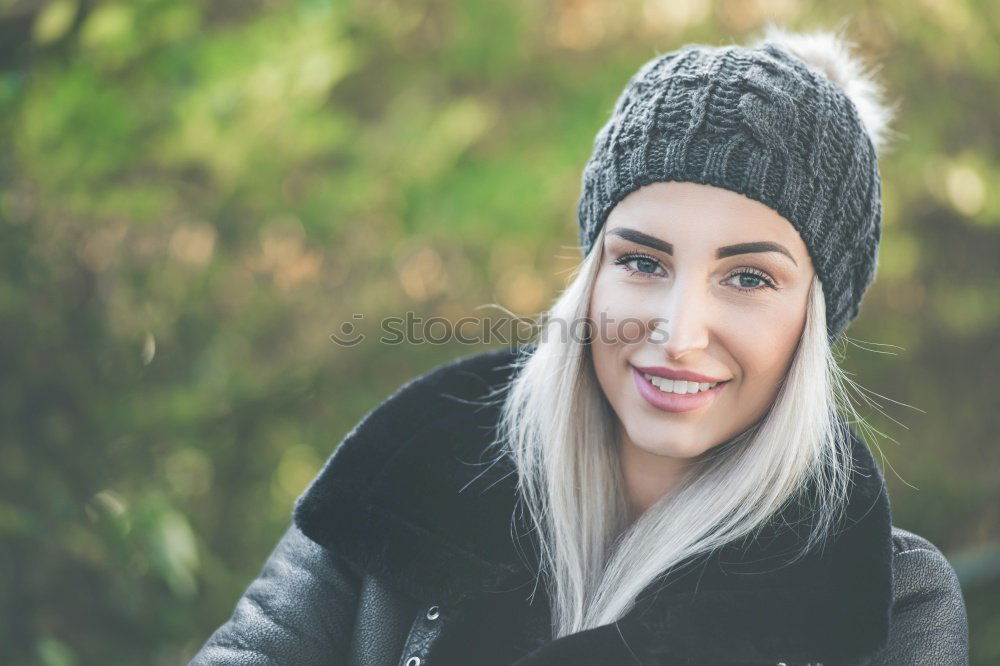 Similar – Happy young blond woman standing on urban background