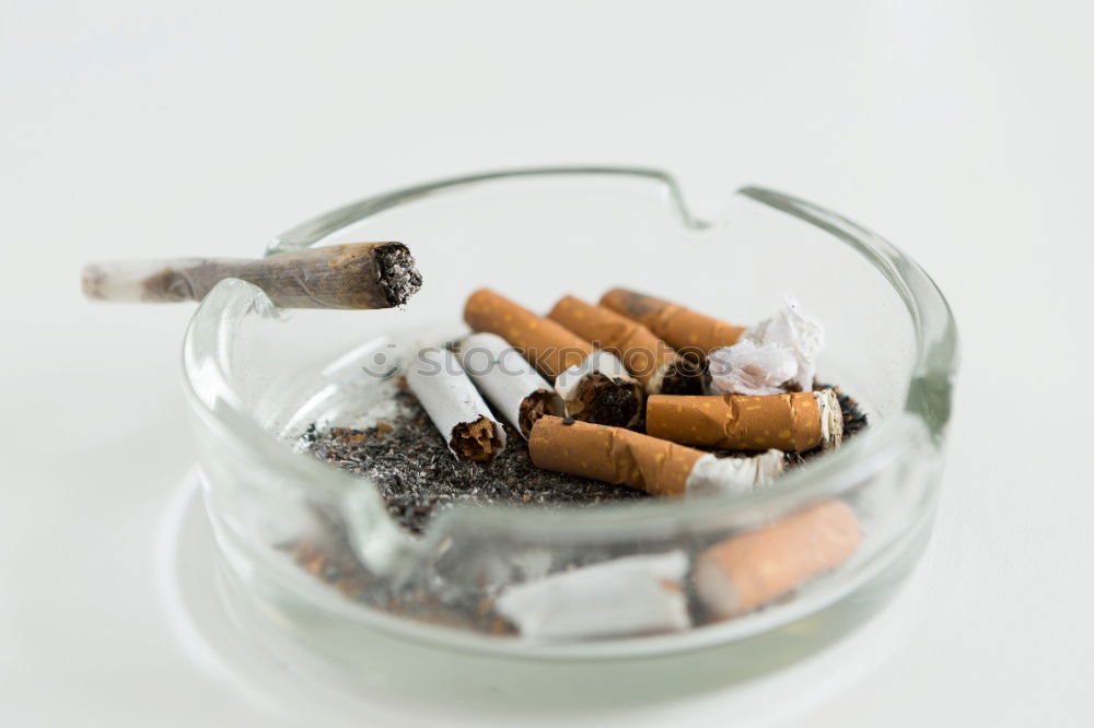 Similar – Image, Stock Photo TeerwerQ Cigarette Smoking