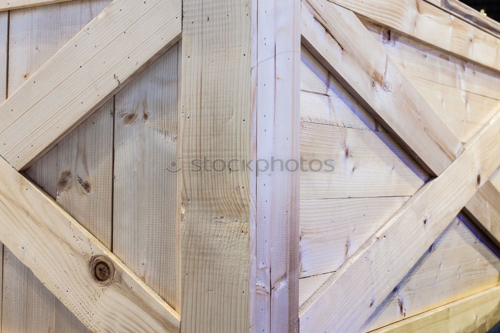 Similar – temporary wooden railing on carcass on construction site