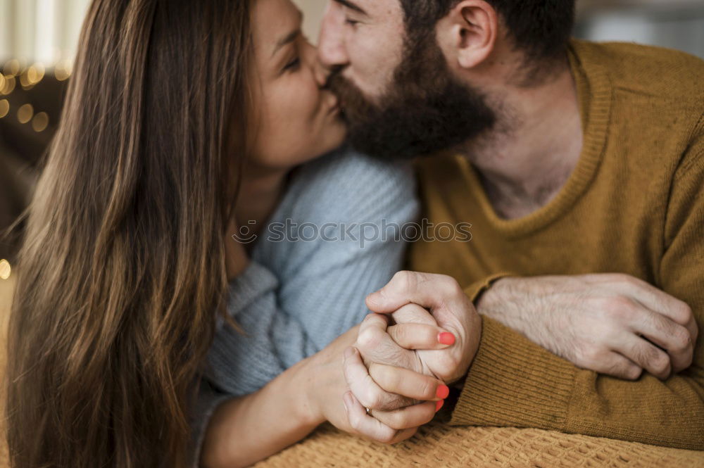 Similar – Close up of bearded man and blonde woman hugging outdoors