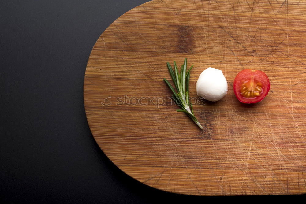 Similar – Image, Stock Photo Mushrooms and parsley on slate table.