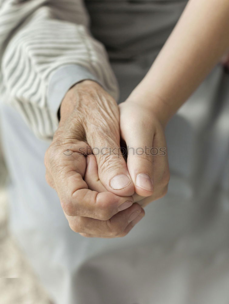 Similar – Baby girl, child and senior man comparing hands size