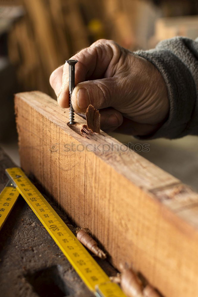 Similar – Carpenter tools on wooden table with sawdust. Circular Saw.