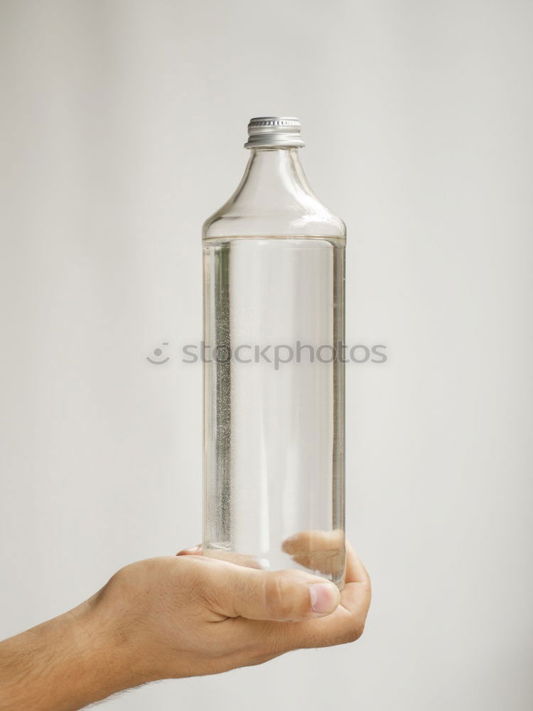 Similar – Boy holding vase with water near face