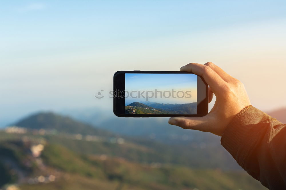 Similar – Image, Stock Photo Hand shooting tree tops