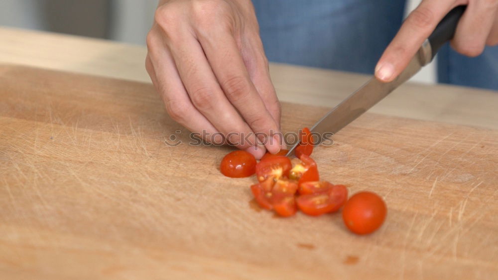 Similar – Girl tying baked Christmas gingerbread cookies with ribbon