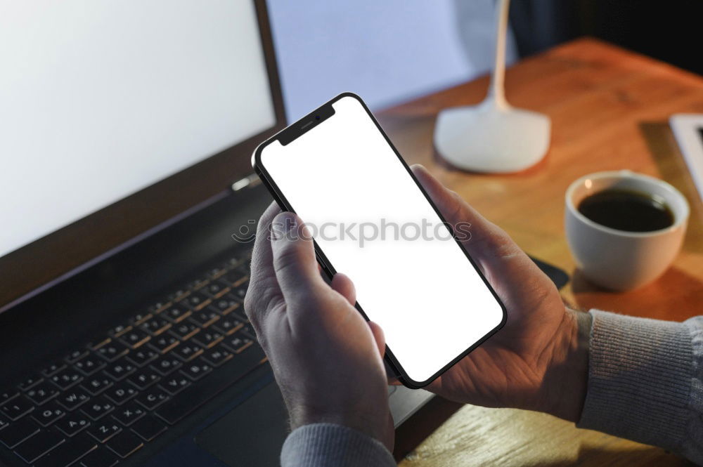 Similar – Woman with cup and smartphone in outside cafe