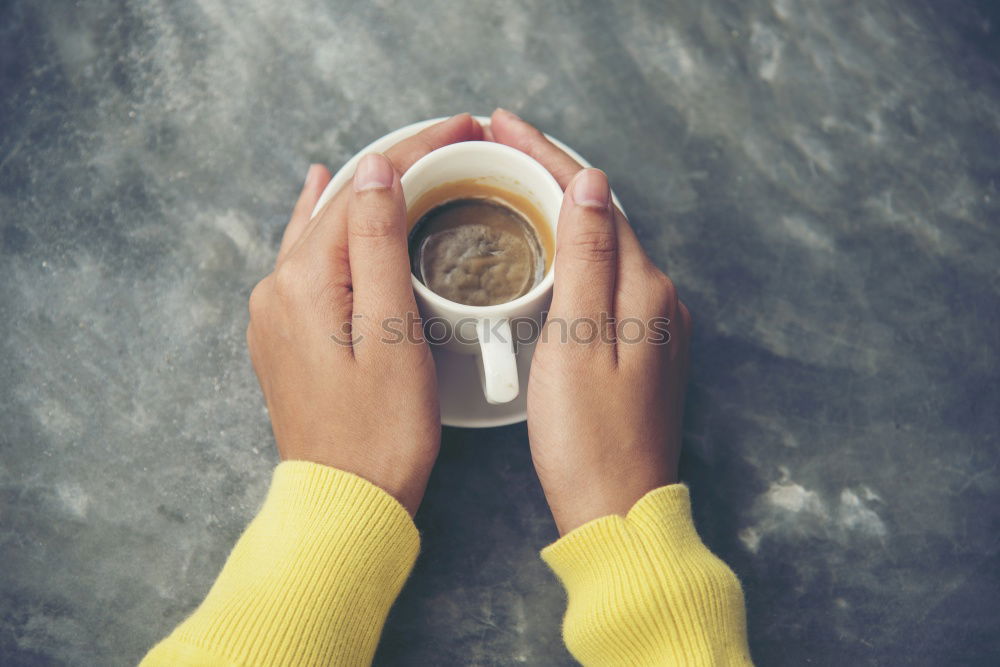 Similar – Image, Stock Photo Turquoise coffee mug held by hands of young woman in yellow pigtail sweater