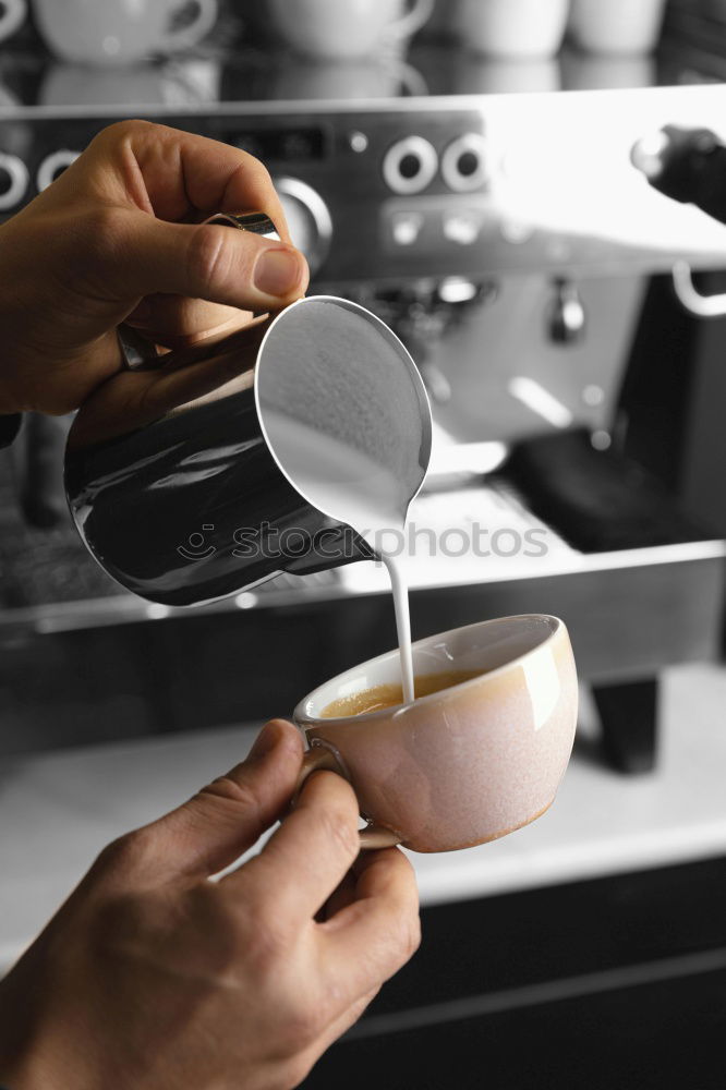 Similar – Hands with coffee cups on table in a urban cafe.