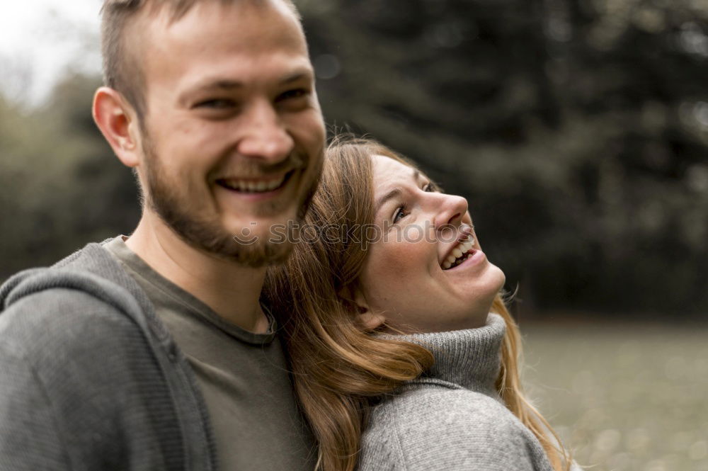 Similar – Image, Stock Photo Young couple cuddling outdoors