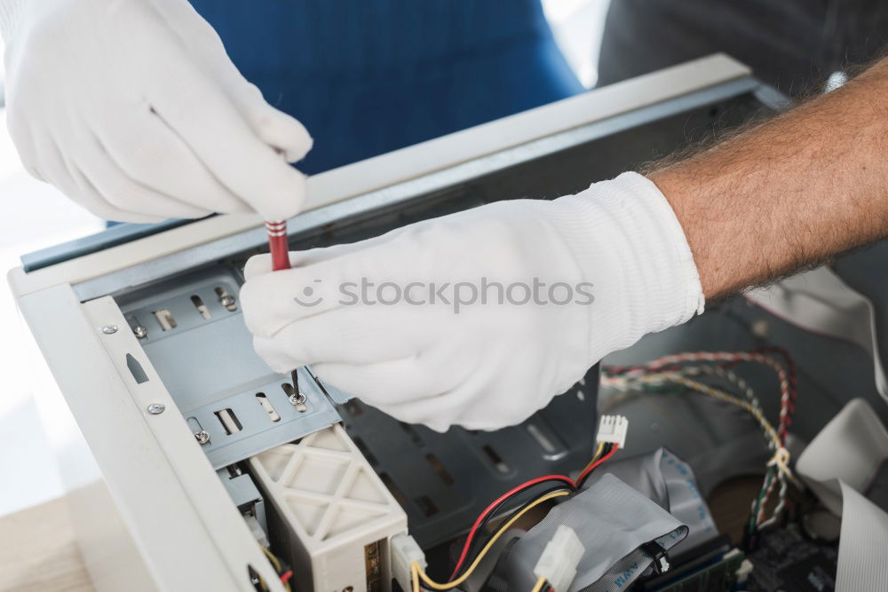 Similar – Image, Stock Photo Mechanic fixing a compressor engine