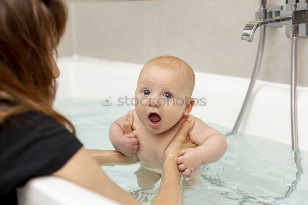 Similar – Image, Stock Photo Newborn taking bath