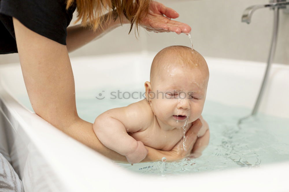 Similar – Image, Stock Photo Newborn taking bath