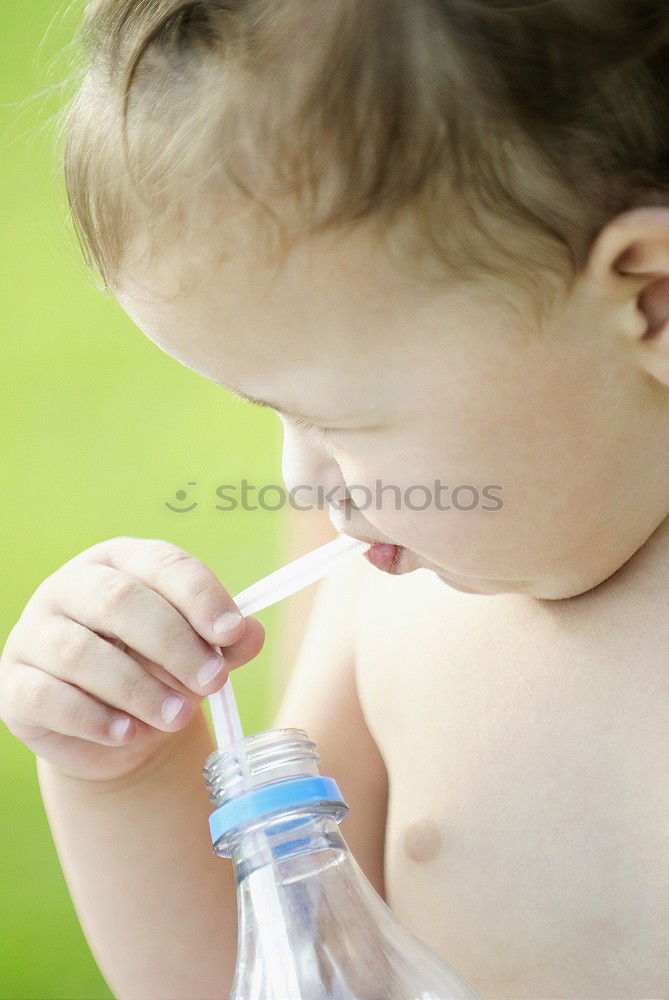 Similar – Image, Stock Photo Baby sucks on a bottle.