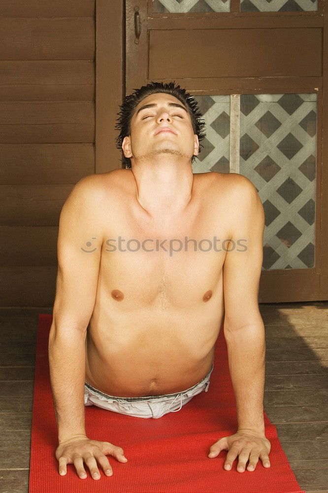Similar – Image, Stock Photo Man doing yoga outdoors at home