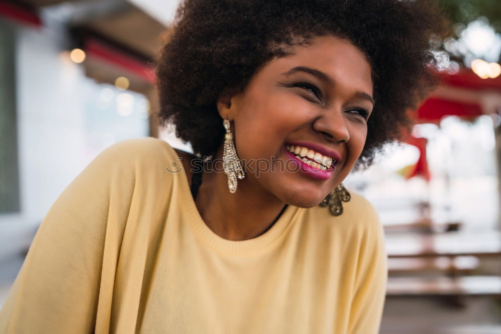 Similar – Beautiful African girl with curly hair on the rooftop