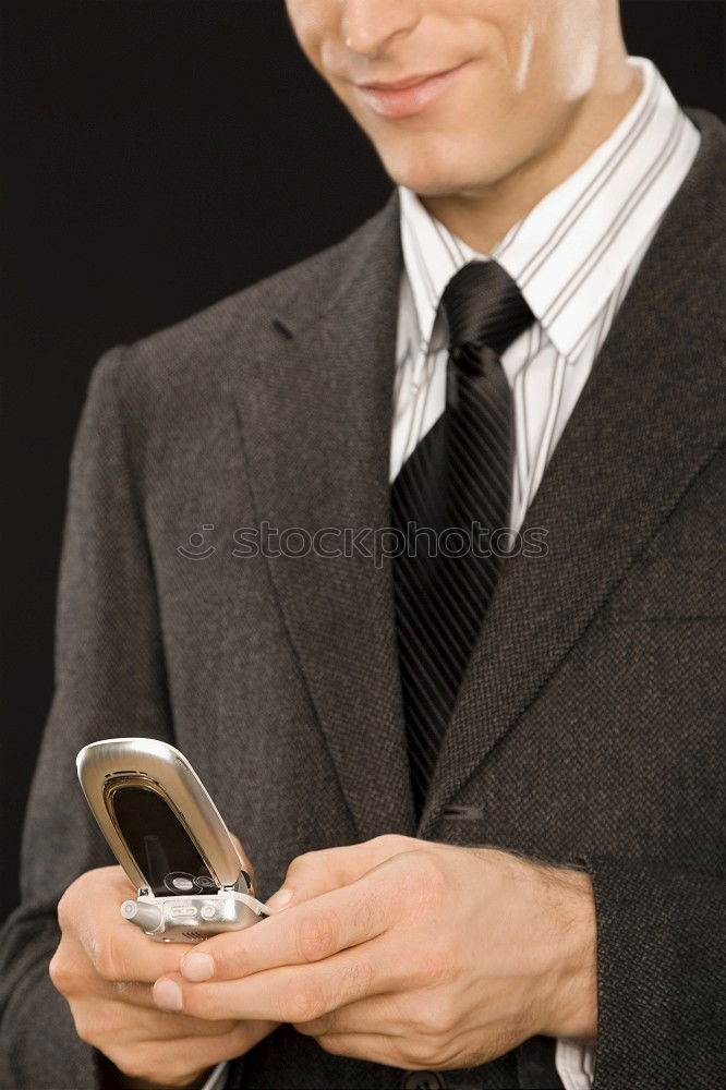 Image, Stock Photo Elegant Young Businessman in the Street Using a Mobile Phone