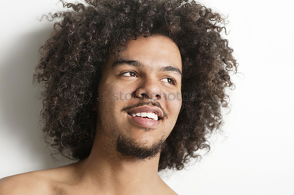 Similar – Image, Stock Photo Black man with afro hair putting on sunglasses. Sunglasses and a