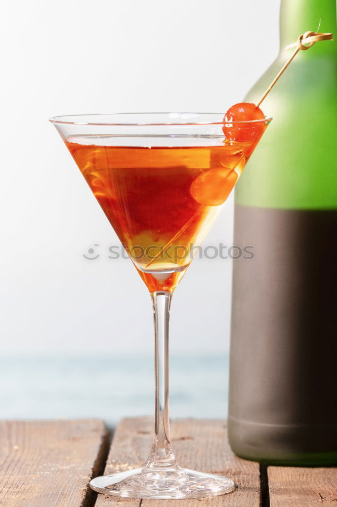 Similar – Hot spicy  cocktail in martini glass