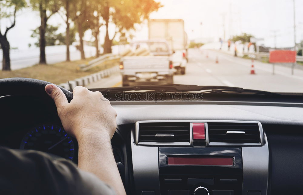 Similar – Image, Stock Photo Young man driving a car