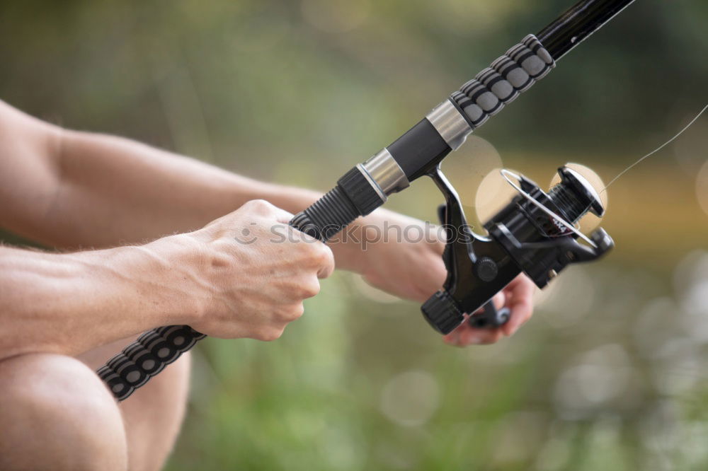 Similar – Man making mark by using pencil in garden