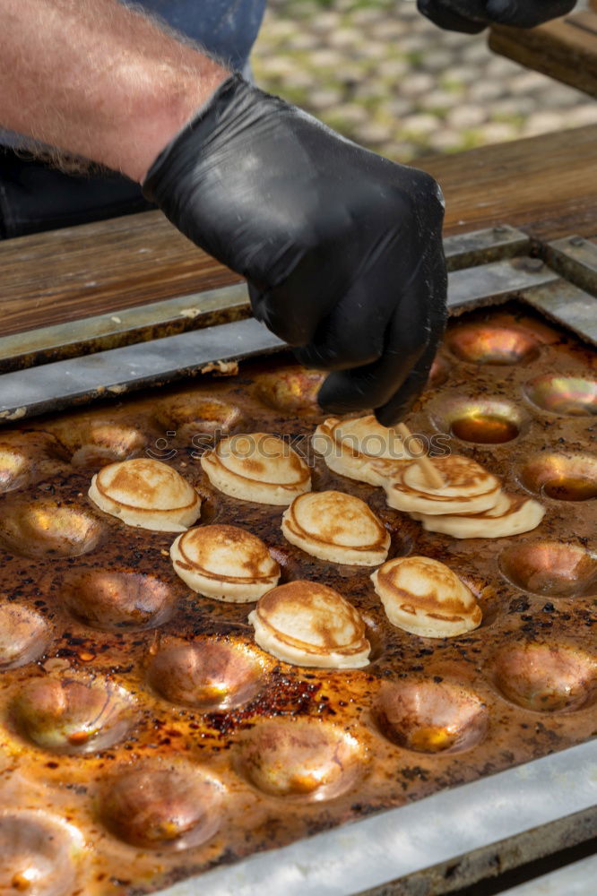 Similar – Baker carrying rack with fresh pastry