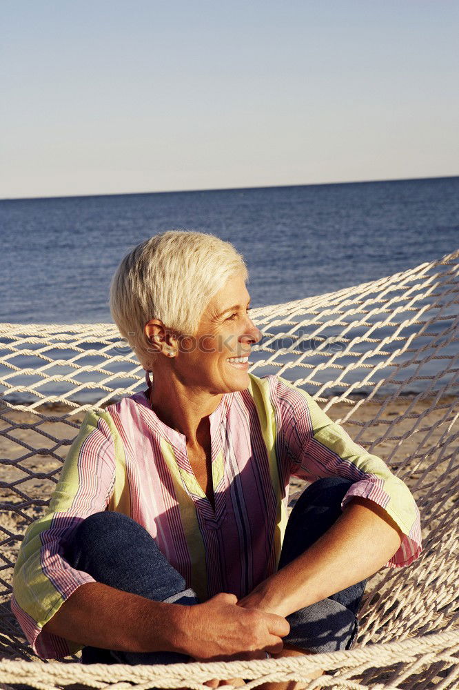 Similar – Image, Stock Photo Senior old woman grey hair sitting by the swimming pool