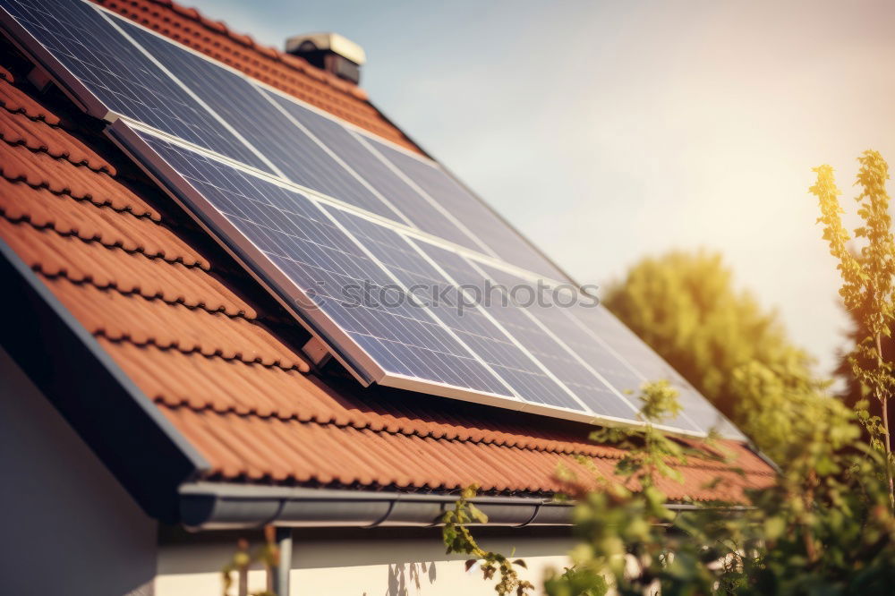 Similar – Allotment garden idyll: Solar panels on the garden house