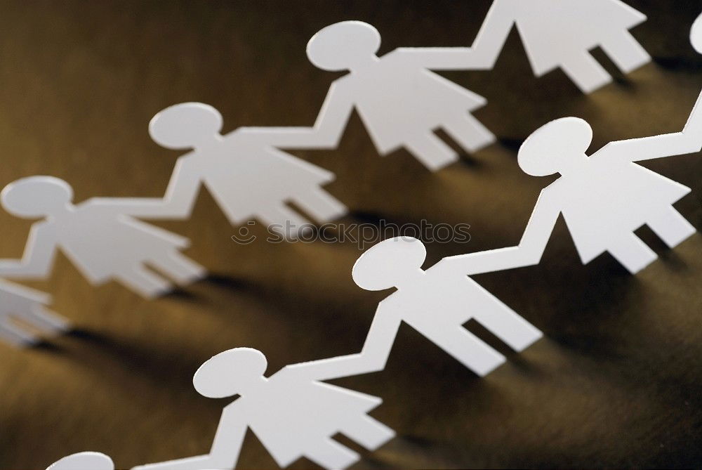 Similar – Paper made people figures