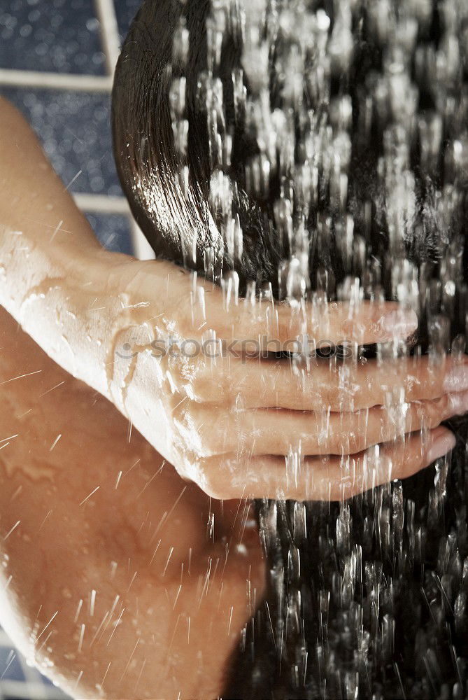 Similar – Woman shampooing her long brown hair