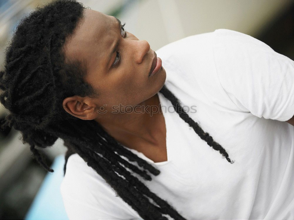 Similar – Image, Stock Photo Young dark skinned woman with dreadlocks