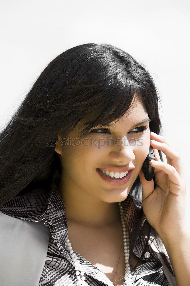 Similar – Smiling Woman in Autumn Fashion Talking on Phone