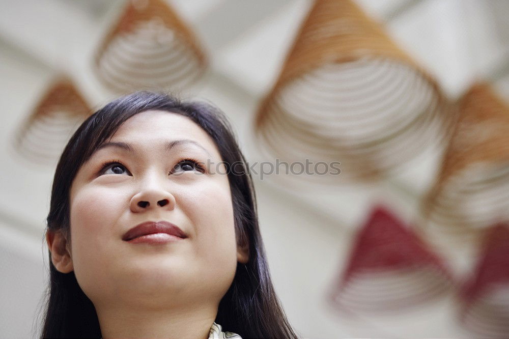 Similar – Woman fanning herself.