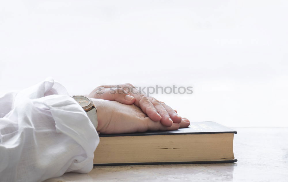 Similar – Weiches Foto von Frauenbeinen auf dem Bett mit einem alten Buch neben ihr