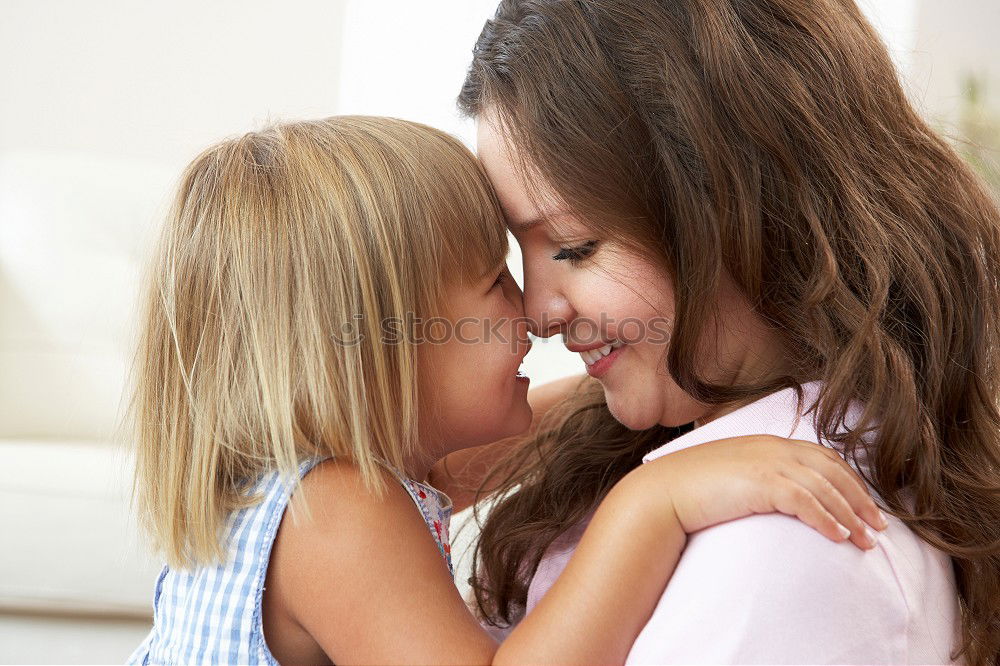 Similar – Image, Stock Photo Beautiful mother and daughter touching each other with their noses. Lovely family portrait