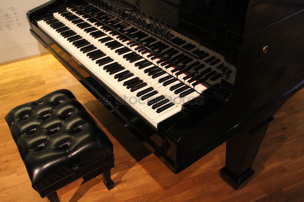 Similar – Image, Stock Photo old piano with a lot of white keys and black ones in the spaces in between