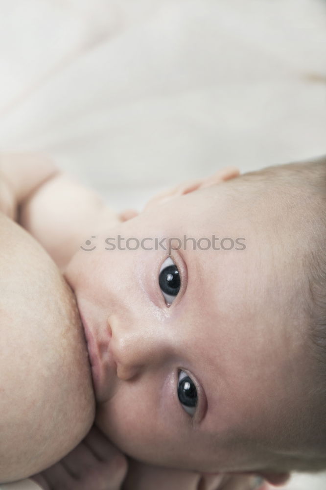 Similar – Person touching hand of baby