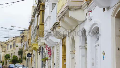 Similar – Image, Stock Photo pretty colorful alleyway in Havana with view to the harbour