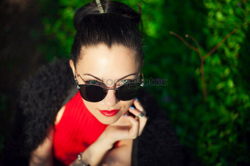 Similar – Image, Stock Photo Cheerful brunette woman lying in grass