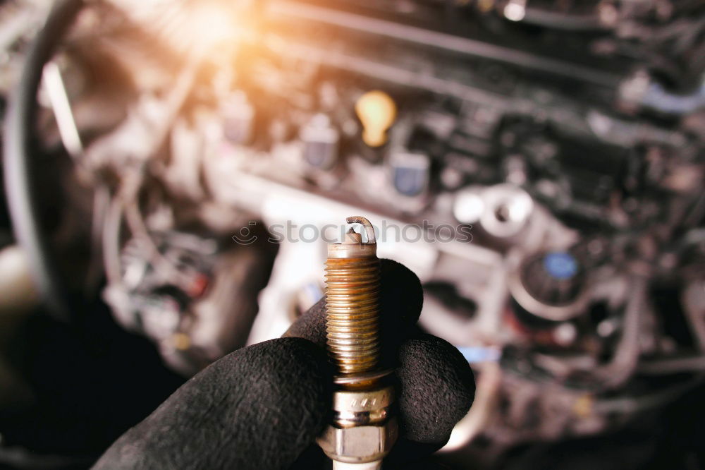 Similar – Professional Mechanic Repairing Car.