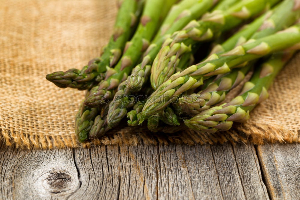 Similar – Image, Stock Photo Fresh asparagus with knife