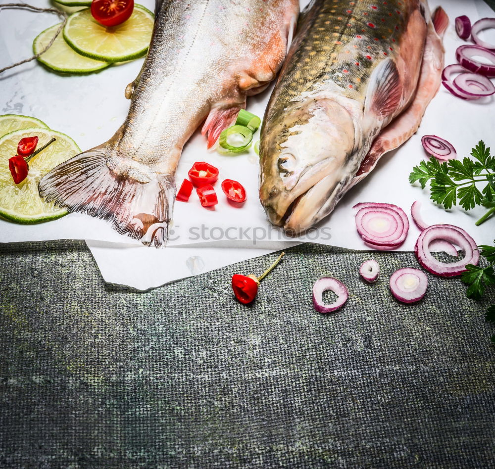 Similar – Fish fillet preparation with vegetables, fennel seeds and spices