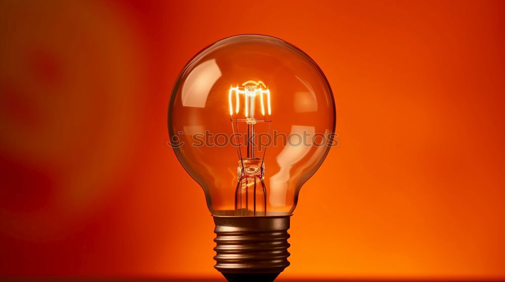 Similar – Orange-coloured LED lights in a row in incandescent optics, shallow depth of field